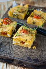 squares of polenta with cheese