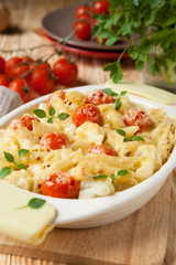 pasta baked with cheese and tomato
