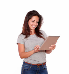 Fototapeta premium Charming young woman using her tablet pc
