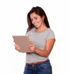 Fototapeta premium Attractive young woman using her tablet pc