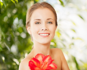 beautiful woman with red lily flower