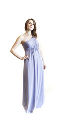 Young Woman with Beautiful Green Eyes in Blue Gown