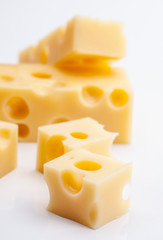 Emmental cheese portions on white base