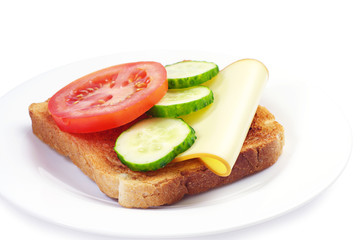 Toast with cheese, tomato and cucumber