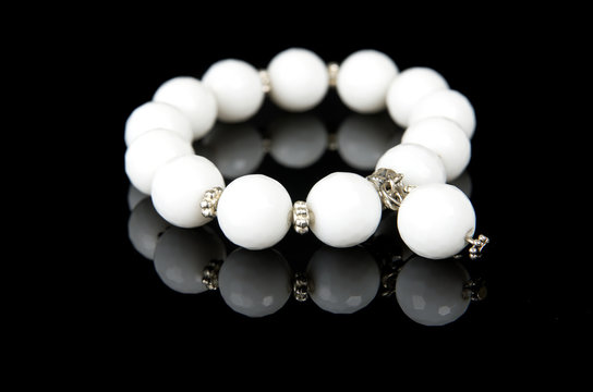 Bracelet with white stones over black