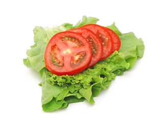 tomato vegetable and lettuce salad isolated on white background
