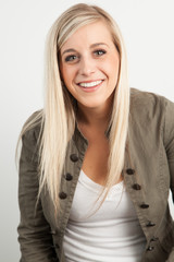 Portrait of a young blond woman smiling