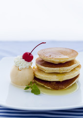 pancakes with ice cream and honey caramel.
