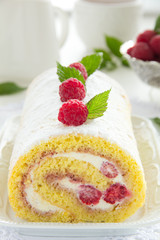 Roulade with raspberries and cream.