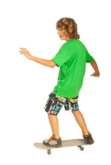 Happy teenager male on skateboard