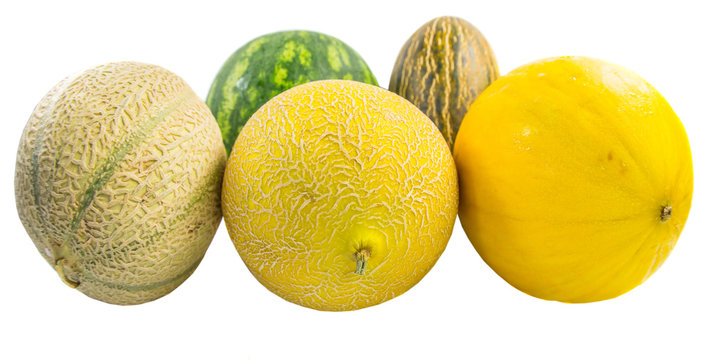 Various types of melons over white background.