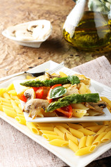 Pasta with fresh tuna, mushrooms and asparagus