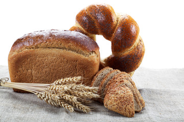 Fresh breads for a variety isolated on white.