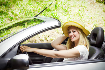 beautiful woman driving the car