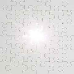 jigsaw puzzle pieces against the light