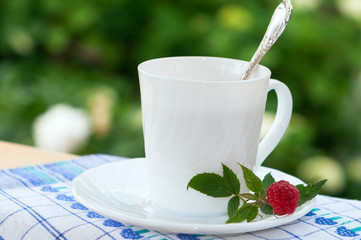 Cup of raspberry tea.