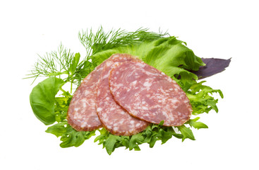 Sausages with salad and basil