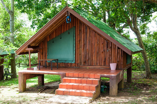 Wooden house or hut  in garden