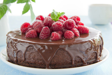 Chocolate cheesecake with raspberries.