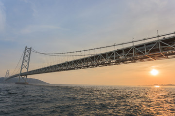 Akashi Kaikyō Bridge at sun set, Kobe, Japan