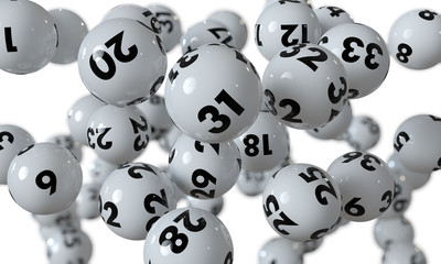 Lottokugeln fallen auf weißem Hintergrund