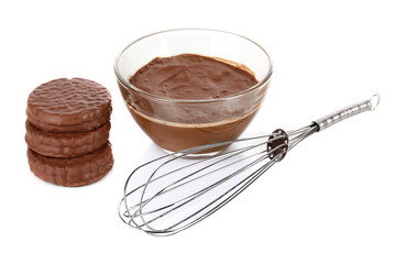 Bowl of chocolate and sweets isolated on white