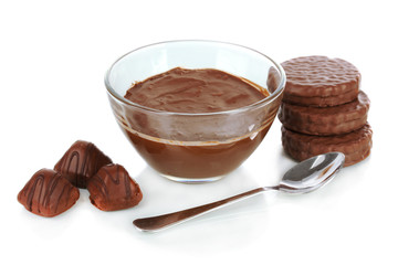 Bowl of chocolate and sweets isolated on white