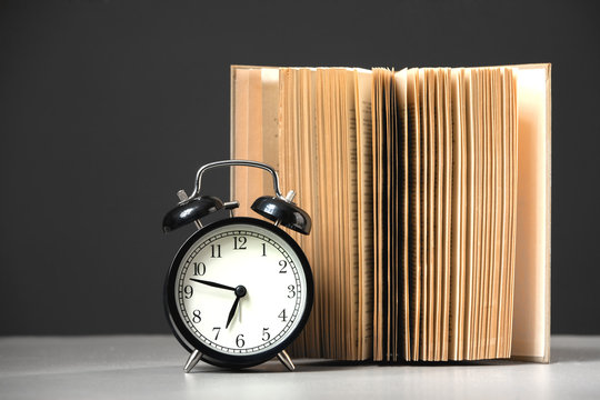 Alarm Clock And Book.