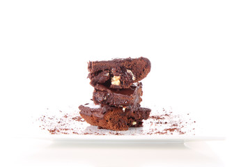 Slices of a brownie with white chocolate chunks