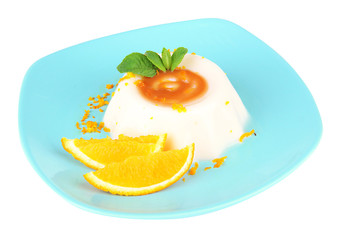 Panna Cotta with orange zest and caramel sauce, isolated