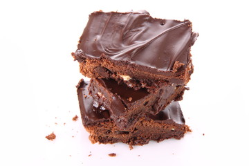 Slices of a brownie with white chocolate chunks