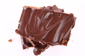 Slices of a brownie with white chocolate chunks