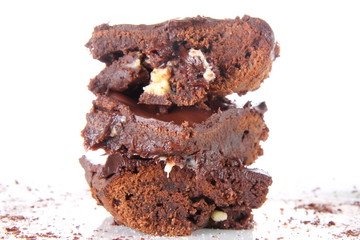 Slices of a brownie with white chocolate chunks