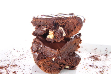 Slices of a brownie with white chocolate chunks