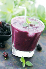 cocktail with ice and mulberries