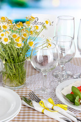 Table setting with chamomiles