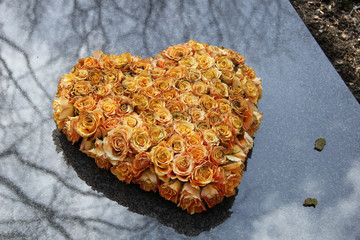 Fototapeta premium Heart shaped sympathy flowers