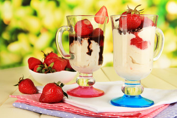 Delicious strawberry desserts in glass vase