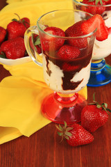 Delicious strawberry desserts in glass vase