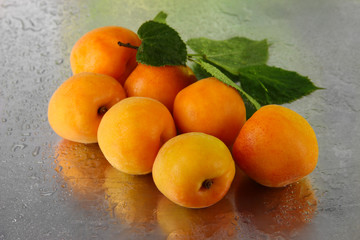 Apricots on metal background