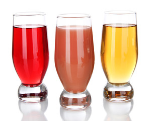 Glasses of fresh juice isolated on white