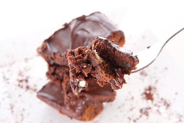 Slices of a brownie with white chocolate chunks