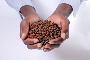  man holding a coffee beans - 53522570
