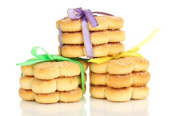 Sweet cookies tied with colorful ribbons isolated on white