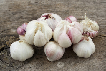 Fresh garlic on rustic wood
