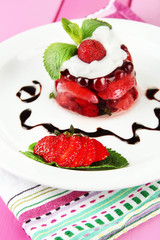Tasty jelly dessert with fresh berries,