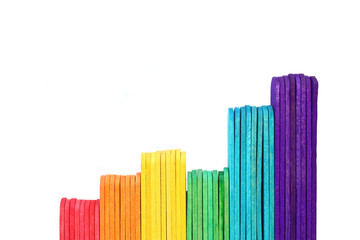 growth graph by ice cream stick on white background