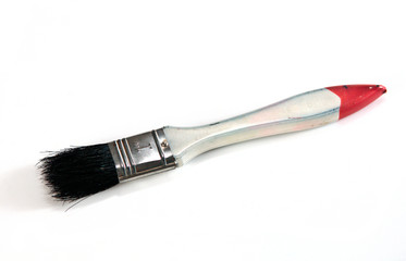 Old paint brushes on white background