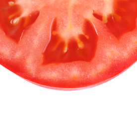 half slice of tomato isolated