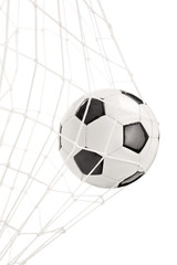 Soccer ball in a goal net